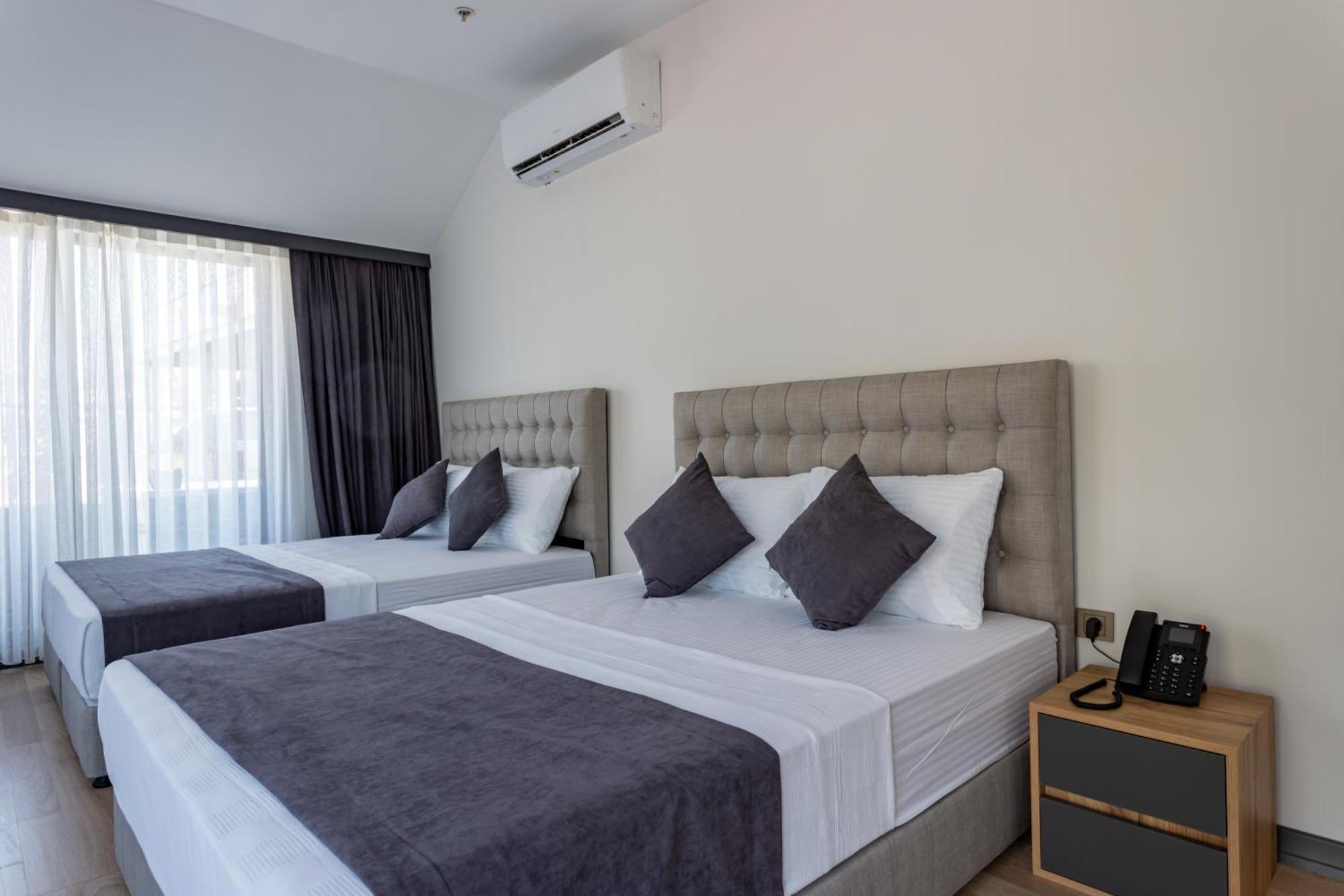 Atm Suit Otel Стамбул Экстерьер фото