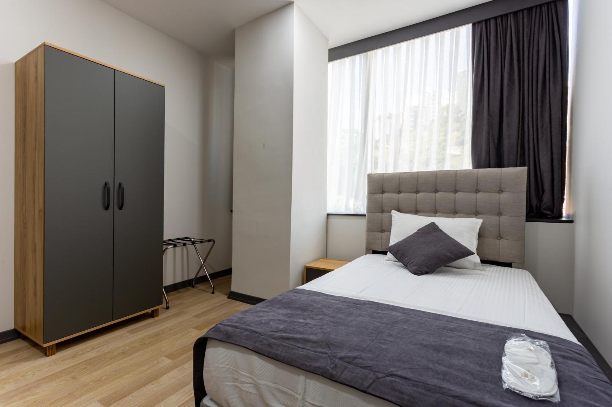 Atm Suit Otel Стамбул Экстерьер фото