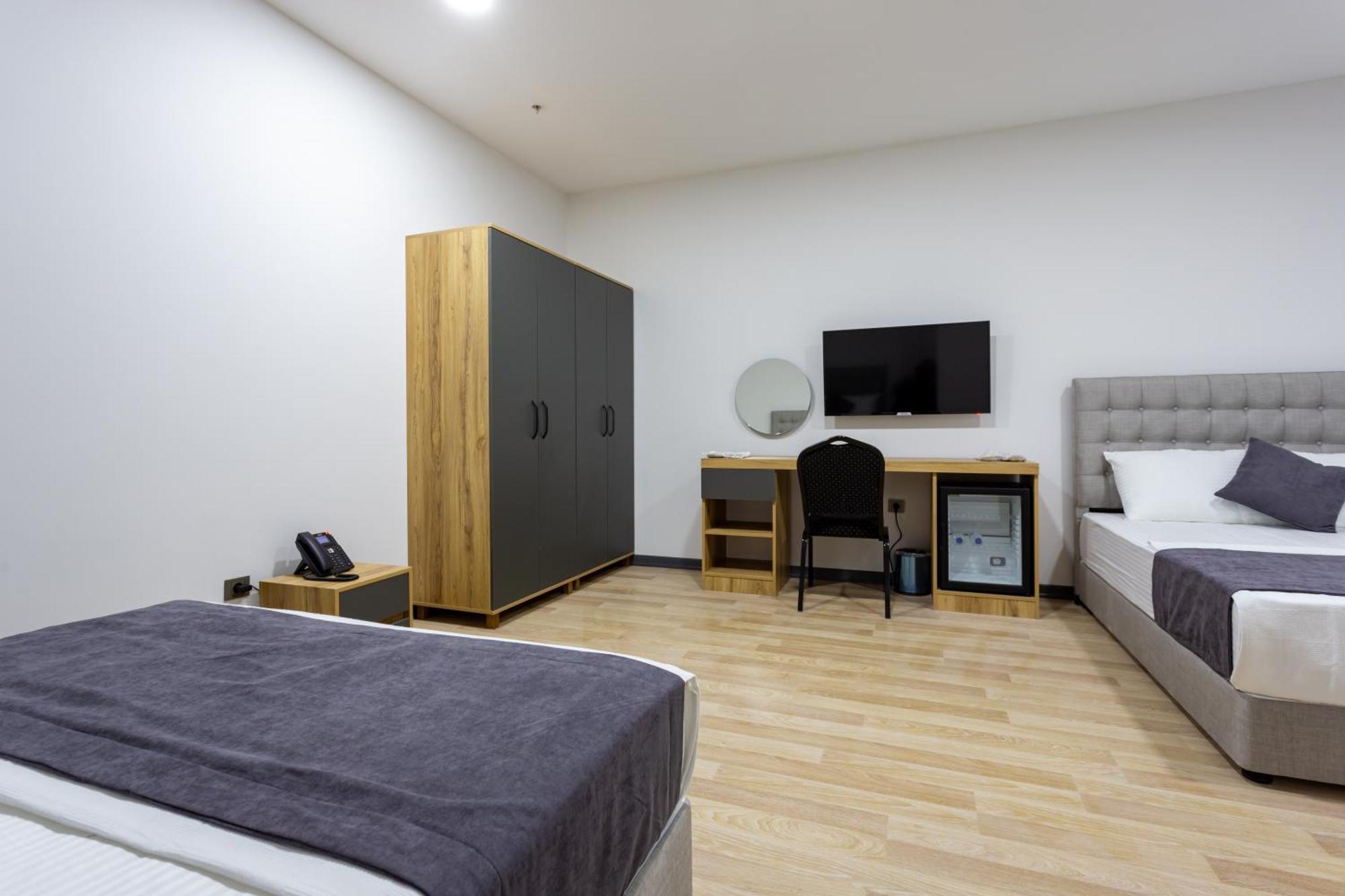 Atm Suit Otel Стамбул Экстерьер фото