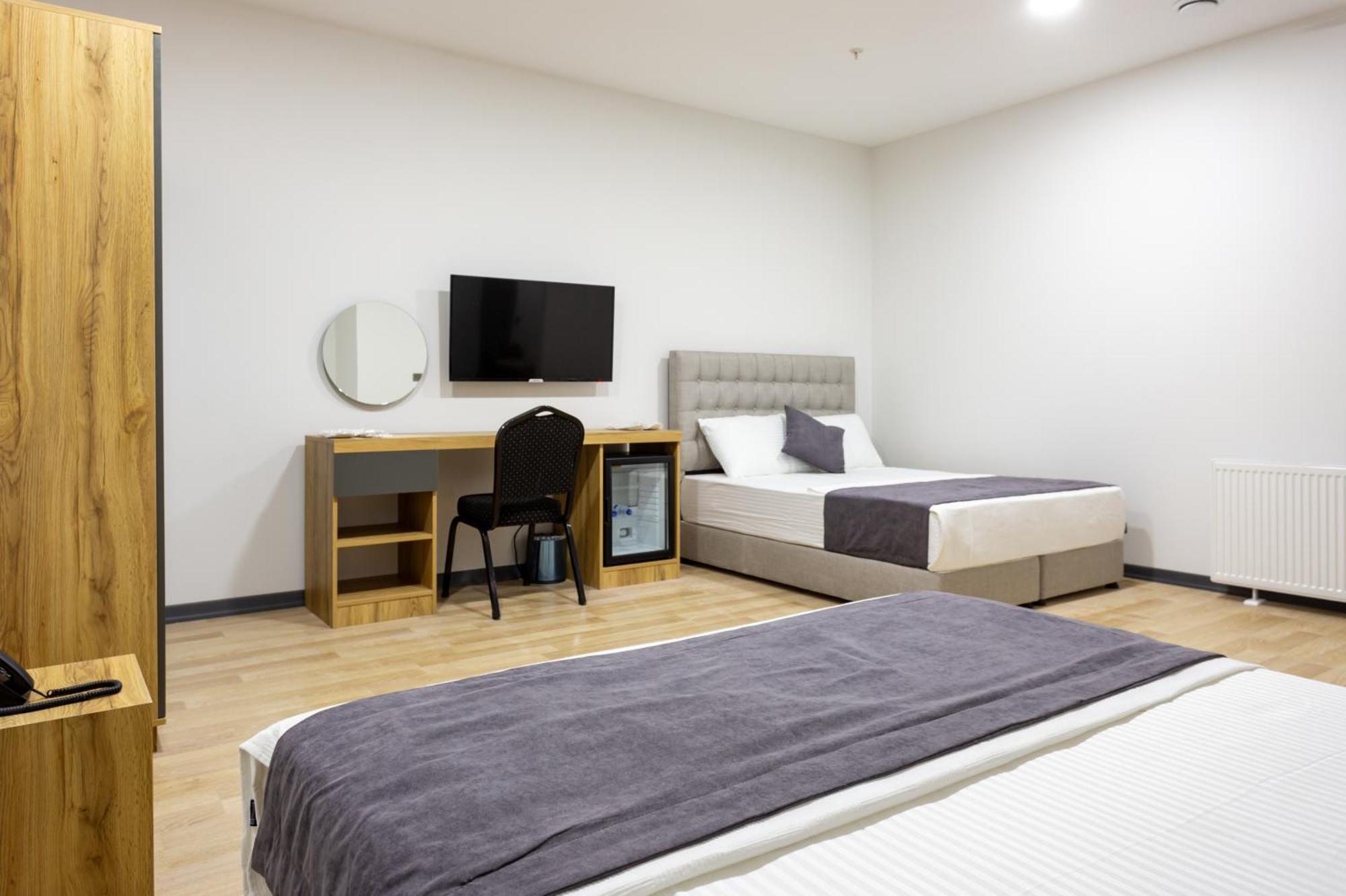 Atm Suit Otel Стамбул Экстерьер фото