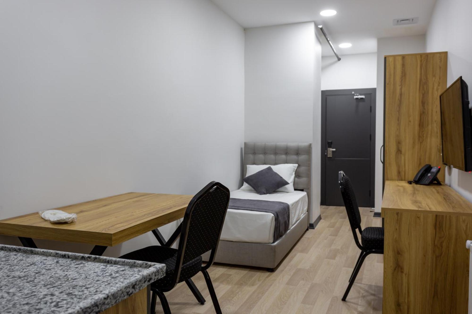 Atm Suit Otel Стамбул Экстерьер фото