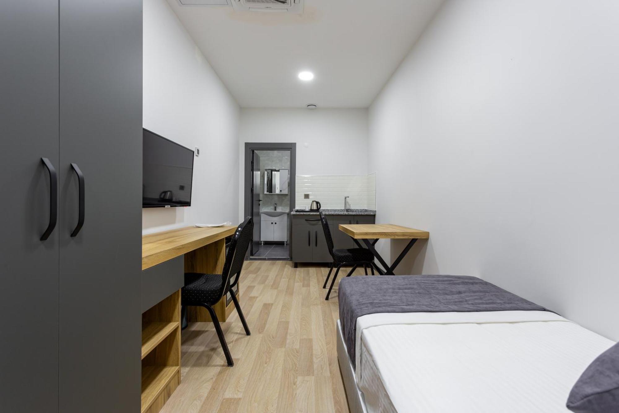 Atm Suit Otel Стамбул Экстерьер фото