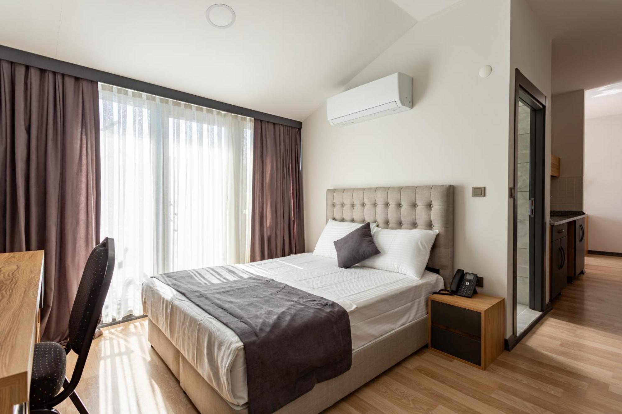 Atm Suit Otel Стамбул Экстерьер фото